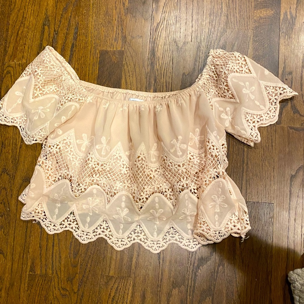 Adorable off the shoulder top.